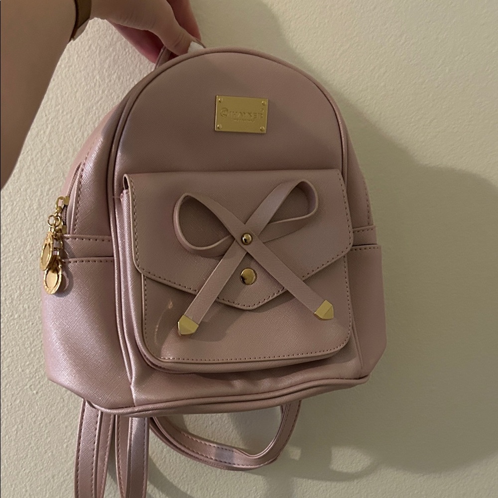 Stylish Pink Backpack with Bow Accent